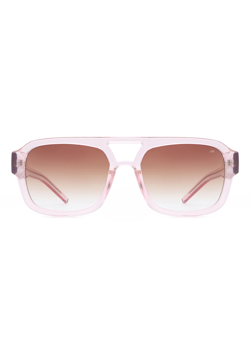 Pink sunglasses with gradient lenses on a white background
