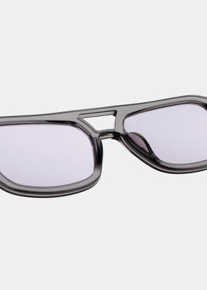 Sunglasses with a gray frame and clear lenses on a white background