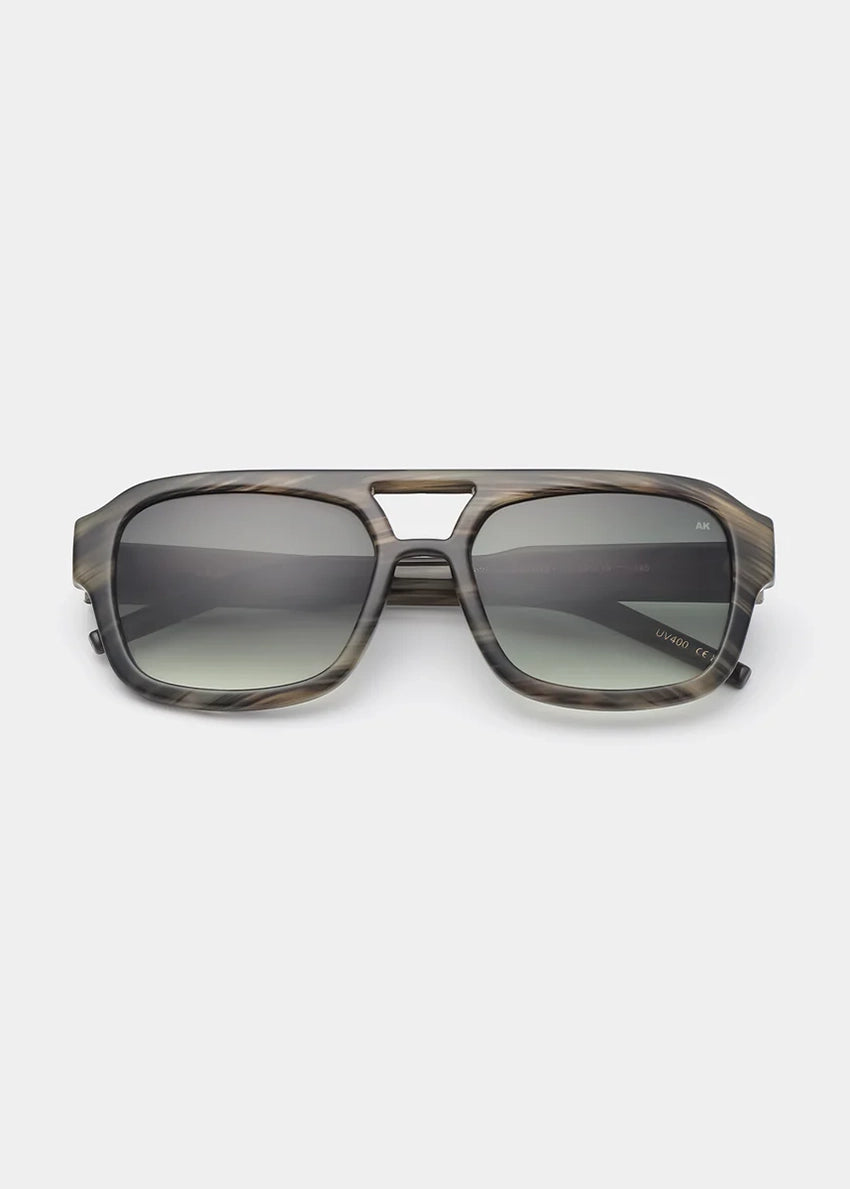 Sunglasses with a gradient lens on a white background