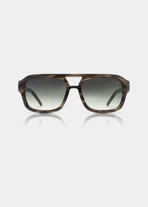 Sunglasses with tortoiseshell frame and gradient lenses on a white background