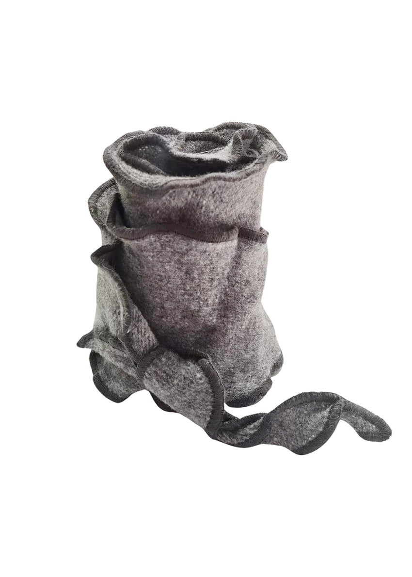 Experience the graceful undulation of our undulated scarves, meticulously crafted from 100% Pure Merino Wool.