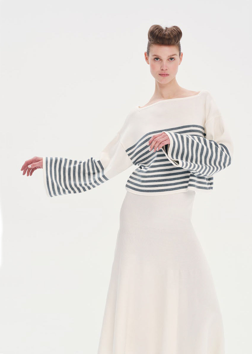 Oversized knit top with stripes.Oversized knit top with stripes made of modal fabric that features bell sleeves.