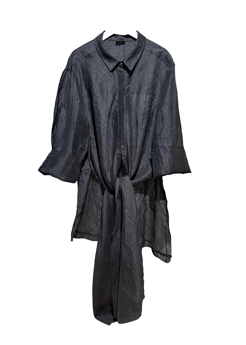 Black shirt with a belt on a white background