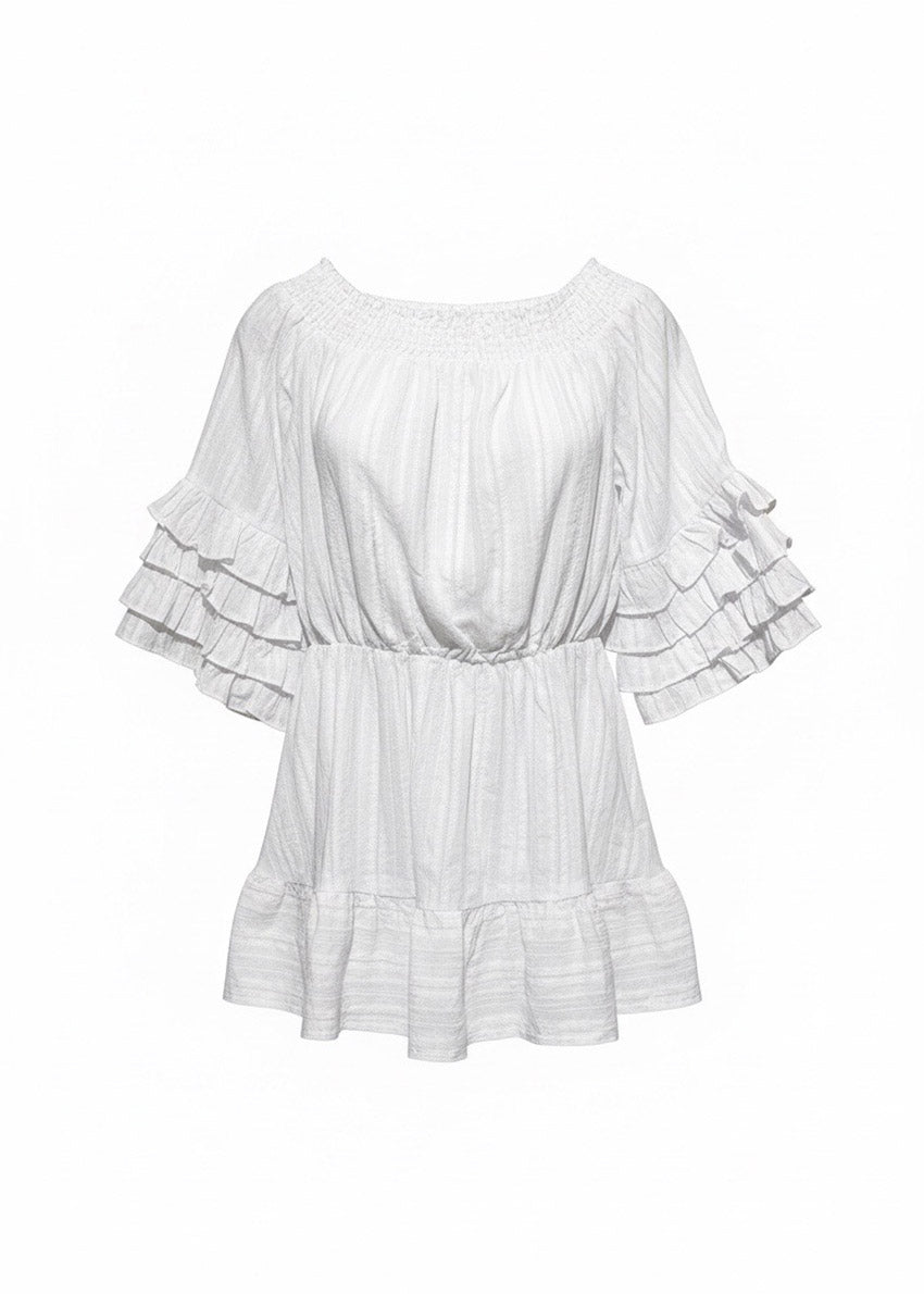 White ruffled blouse on a white background