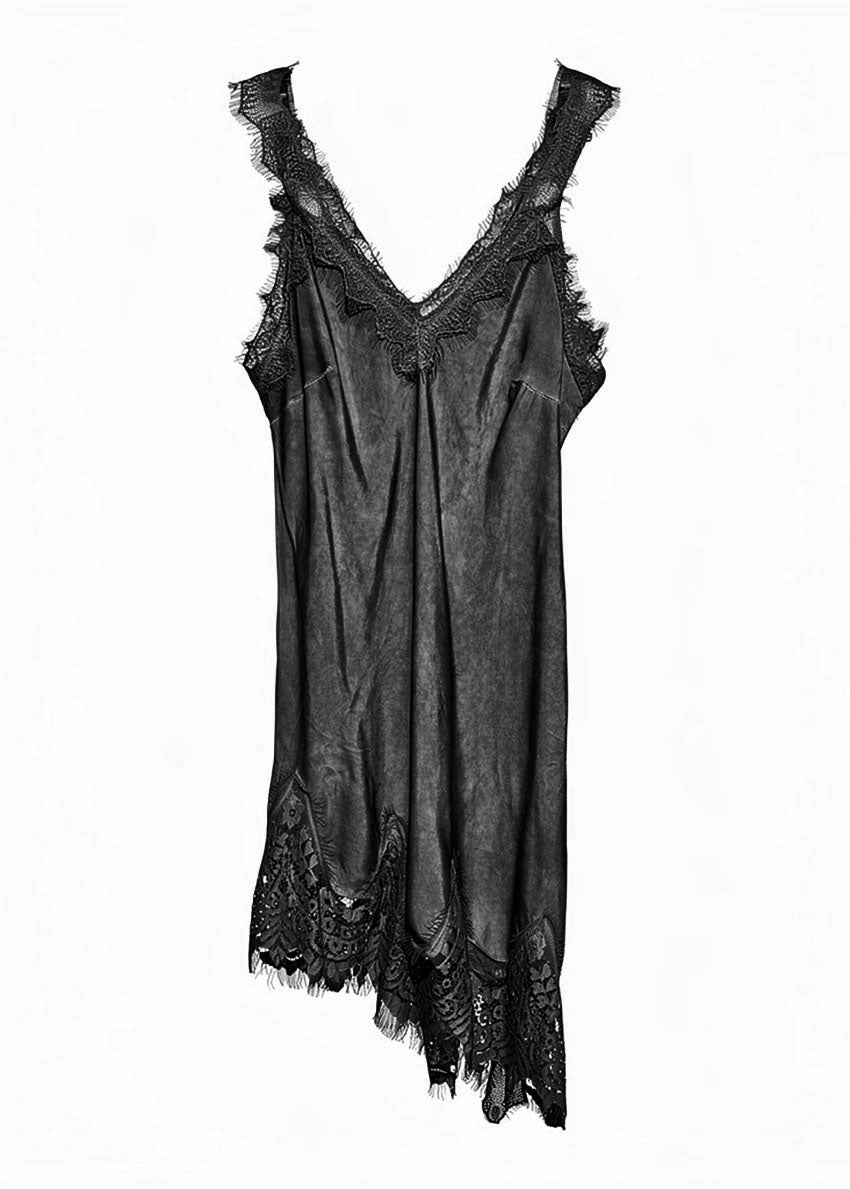 Black lace slip dress on a white background