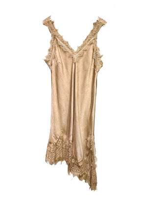 Beige lace dress on a white background