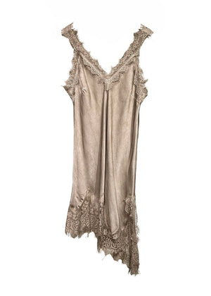 Silky dress with lace details on a white background