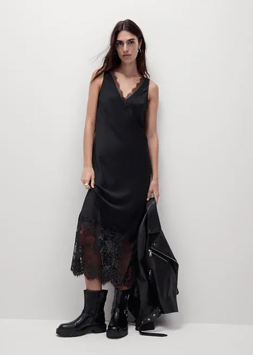 Discover timeless elegance with our Black Viscose Satin Full-Length Dress. Crafted from a lightweight satin weave, features a flattering V-neckline and delicate lace trim with scallop edges. The lace panel at the hem and scallop hemline , perfect for any occasion. With a convenient pull-on style