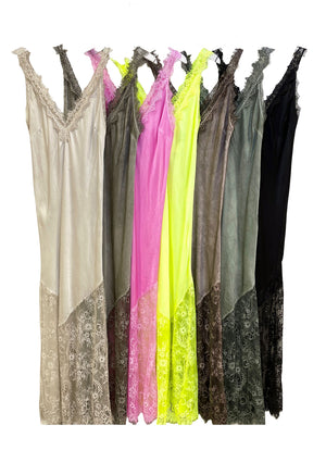 Discover timeless elegance with our Viscose Satin Full-Length Dress. Crafted from a lightweight satin weave, features a flattering V-neckline and delicate lace trim with scallop edges. The lace panel at the hem and scallop hemline , perfect for any occasion. With a convenient pull-on style