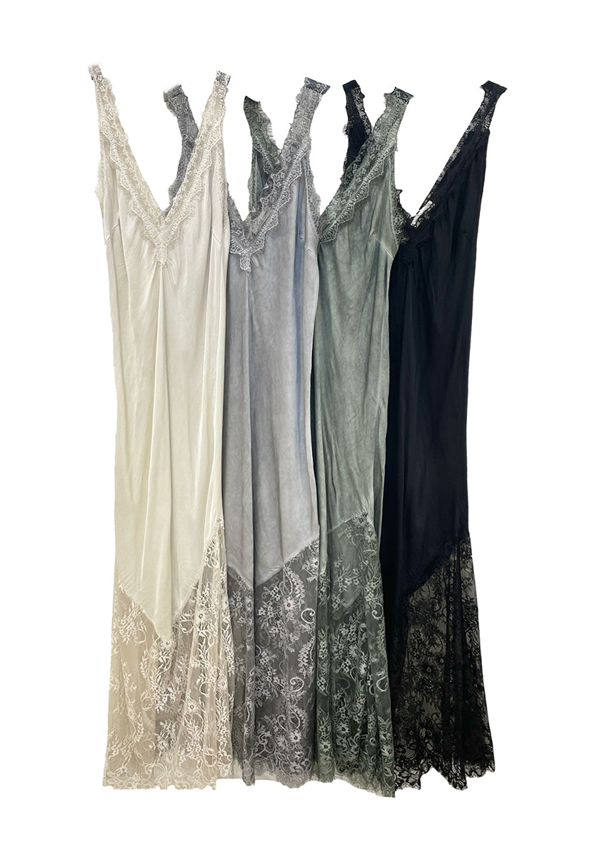 Discover timeless elegance with our Viscose Satin Full-Length Dress. Crafted from a lightweight satin weave, features a flattering V-neckline and delicate lace trim with scallop edges. The lace panel at the hem and scallop hemline , perfect for any occasion. With a convenient pull-on style