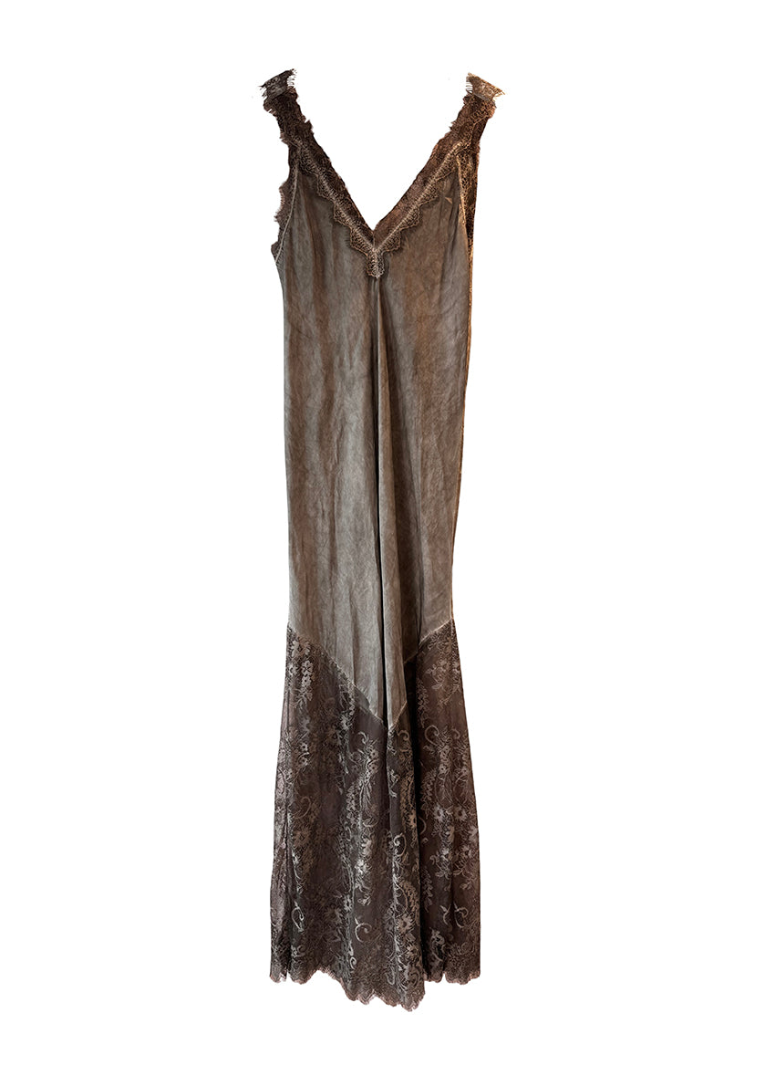 Discover timeless elegance with our Brown Viscose Satin Full-Length Dress. Crafted from a lightweight satin weave, features a flattering V-neckline and delicate lace trim with scallop edges. The lace panel at the hem and scallop hemline , perfect for any occasion. With a convenient pull-on style