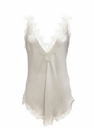 Beige lace-trimmed top on a white background