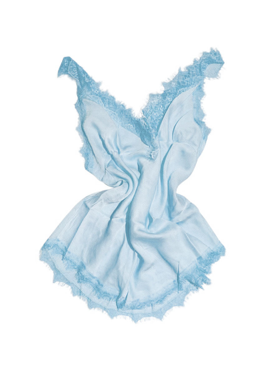 Light blue lace top on a white background