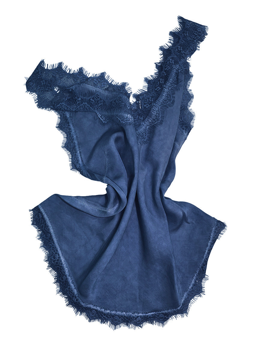 Navy blue lace top on a white background