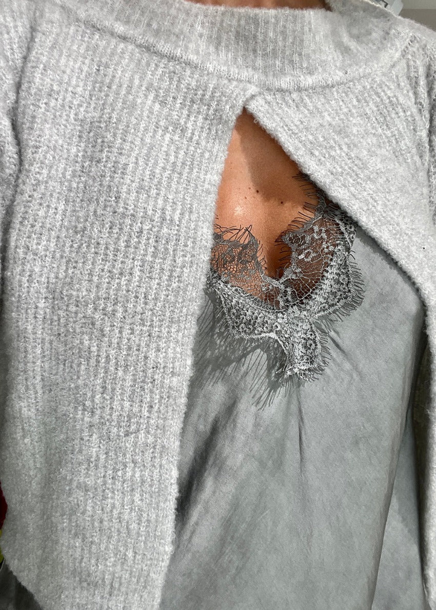 A dim grey  lace V-neck tank top with delicate lace trim.