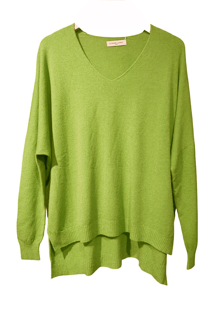 Green sweater on a white background