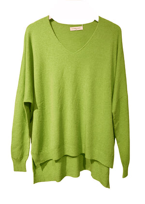 Green sweater on a white background
