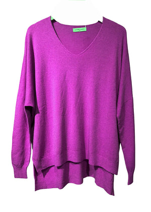 Purple sweater on a white background