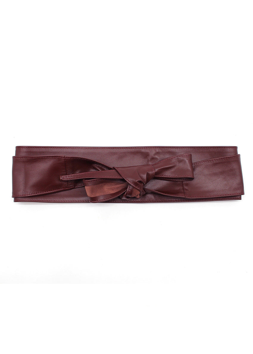 Tie it your way—this wine leather belt adapts to your mood with five distinct styling options: ocho, bow, rosette, twist, or classic knot. Slip it on, wrap it around, and let your personal flair take the lead.