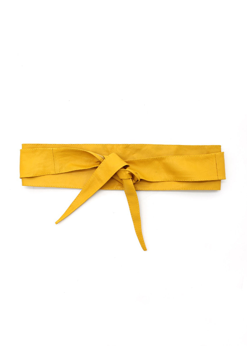 Tie it your way—this yellow leather belt adapts to your mood with five distinct styling options: ocho, bow, rosette, twist, or classic knot. Slip it on, wrap it around, and let your personal flair take the lead.