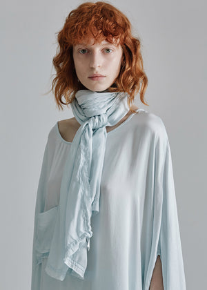 Unisex scarf made from soft satin silk, with frayed edges.