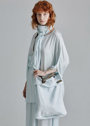 Unisex scarf made from soft satin silk, with frayed edges.