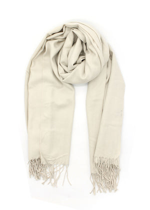 Beige shawl with fringed details on a white background