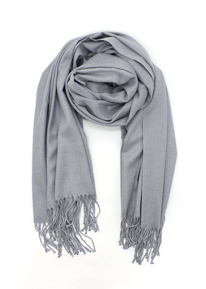 Gray scarf with tassels on a white background