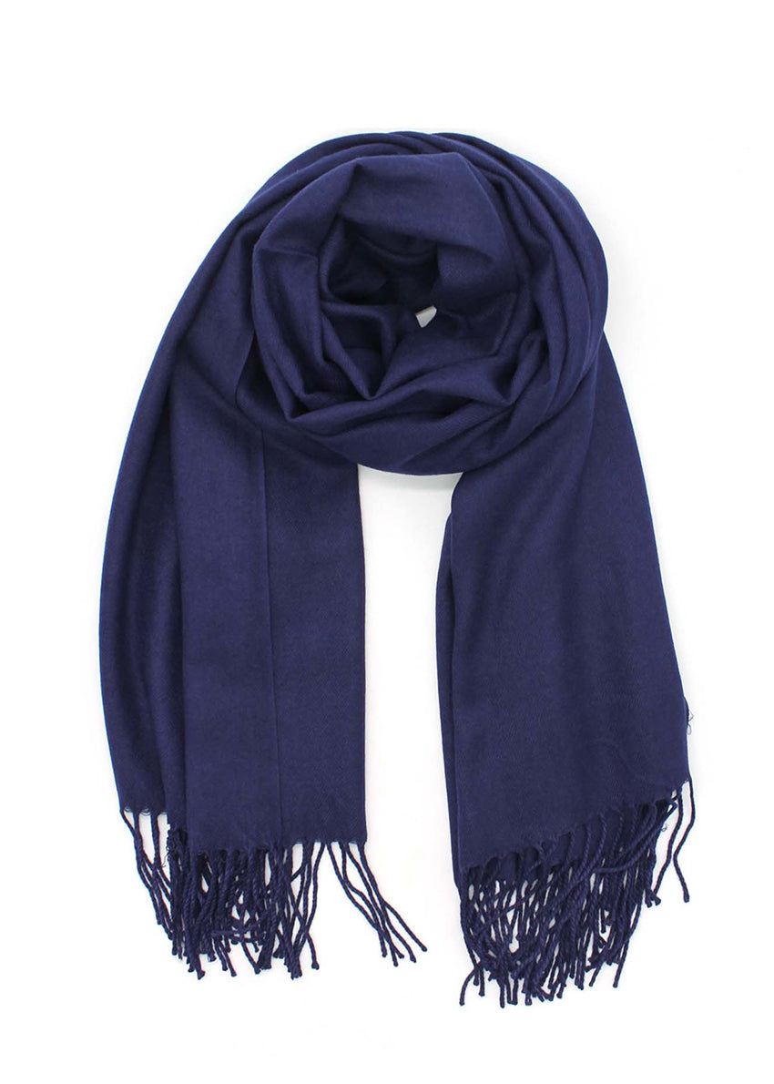 Midnight blue shawl with fringed details on a white background