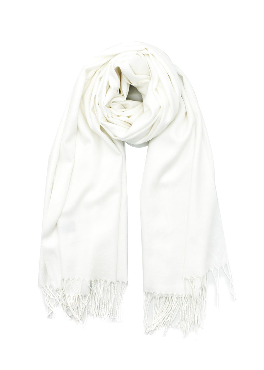 White shawl with fringed details on a white background