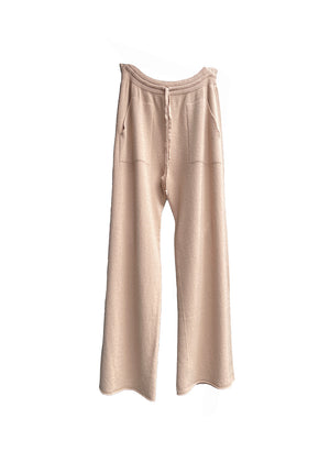 Beige knit long wide pants with pockets on a white background