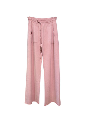 Pink knit long wide pants with pockets on a white background