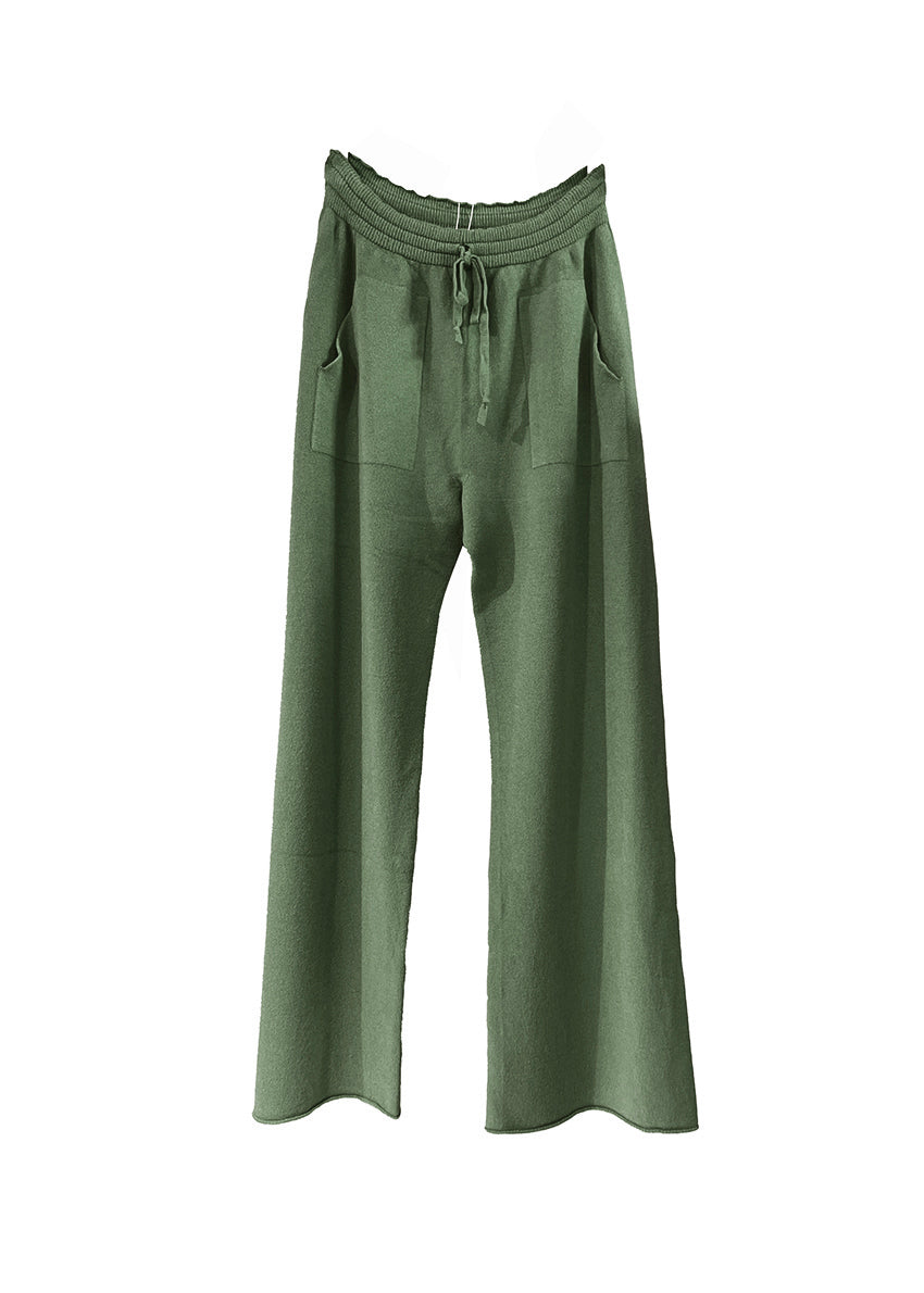 Dark olive green knit long wide pants with pockets on a white background