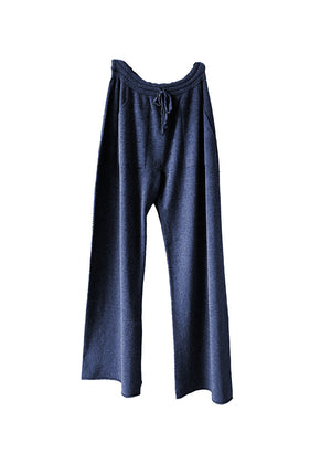 Midnight blue knit long wide pants with pockets on a white background 