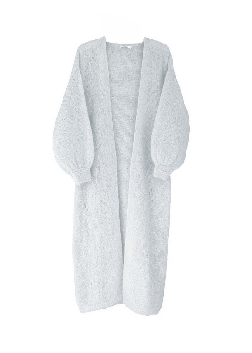 A alice blue mohair cardigan with long sleeves and a V-neck design, designed to be worn over other clothing items.