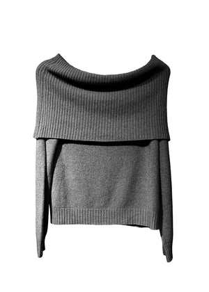 This black sweater embodies the beauty of simplicity. It features a light texture, straight cut, waffle neckline, and long sleeves - perfect for your everyday wardrobe.