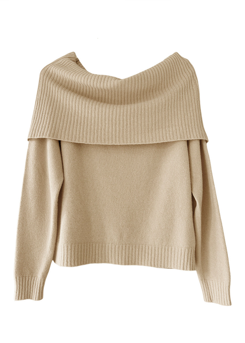 This tan sweater embodies the beauty of simplicity. It features a light texture, straight cut, waffle neckline, and long sleeves - perfect for your everyday wardrobe.