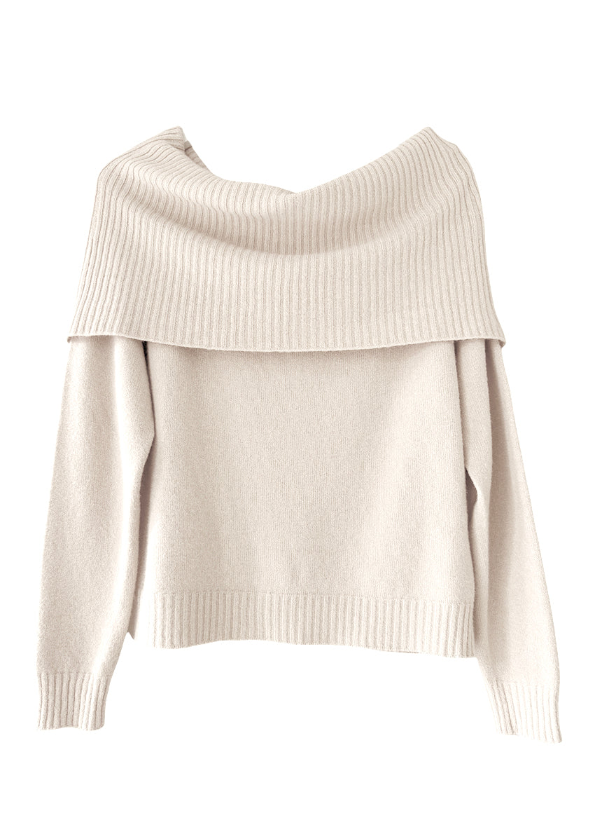 This wheat sweater embodies the beauty of simplicity. It features a light texture, straight cut, waffle neckline, and long sleeves - perfect for your everyday wardrobe.