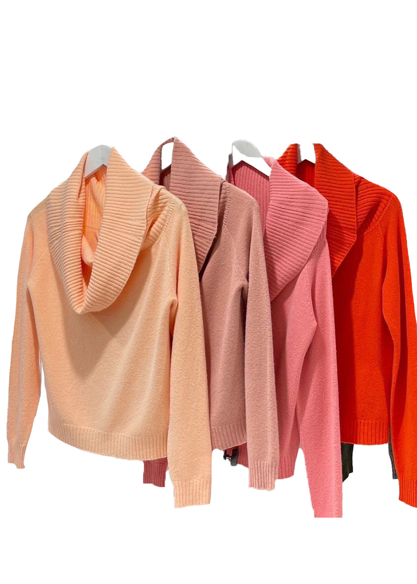 This sweater embodies the beauty of simplicity. It features a light texture, straight cut, waffle neckline, and long sleeves - perfect for your everyday wardrobe.