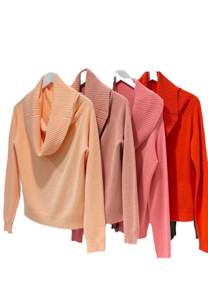 This sweater embodies the beauty of simplicity. It features a light texture, straight cut, waffle neckline, and long sleeves - perfect for your everyday wardrobe.