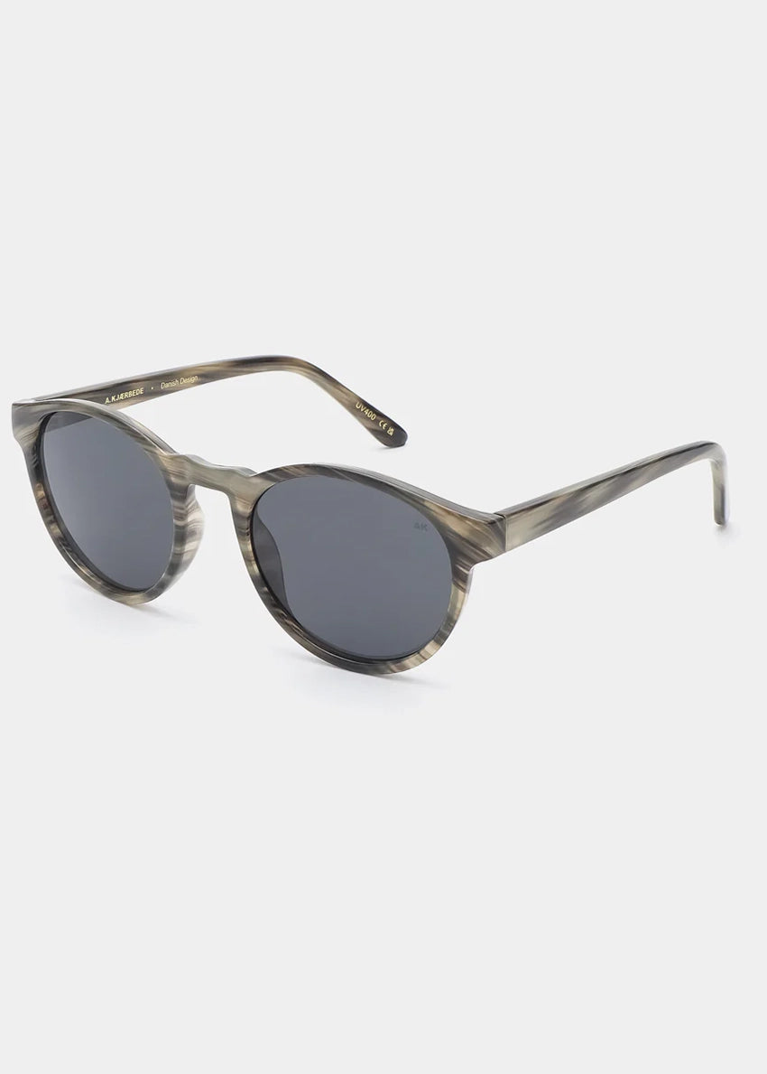 Sunglasses with a tortoiseshell frame on a white background