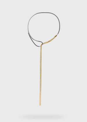 A gold and gun metal plated necklace with a thin metallic rod and a delicate chain.