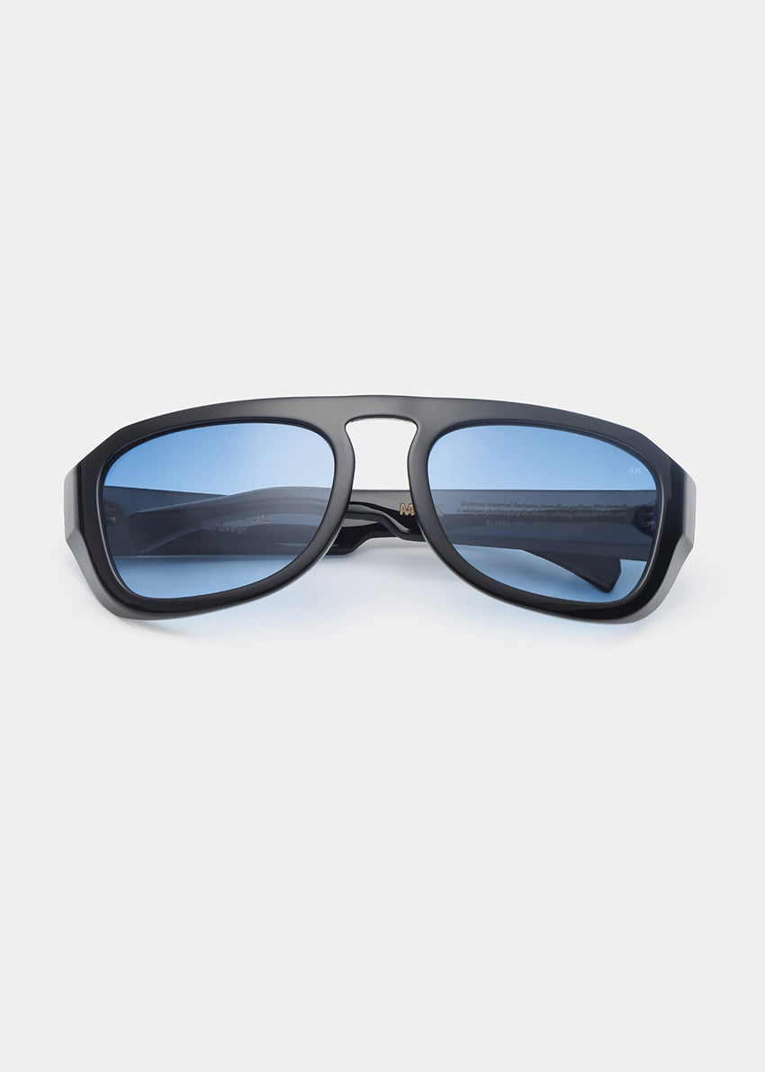 Black sunglasses with blue lenses on a white background