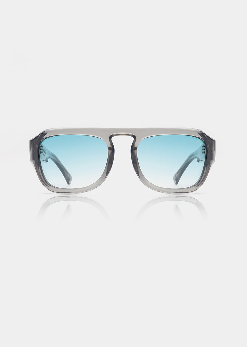 Sunglasses with blue gradient lenses on a white background