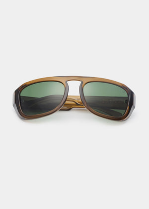 Wooden-framed sunglasses with green lenses on a white background