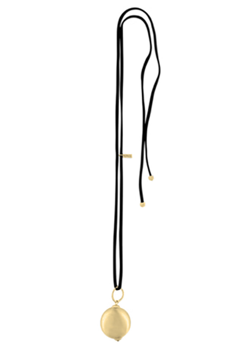 A gold-plated oversized ball pendant necklace with a black chain and a small gold chain attached to the ball.