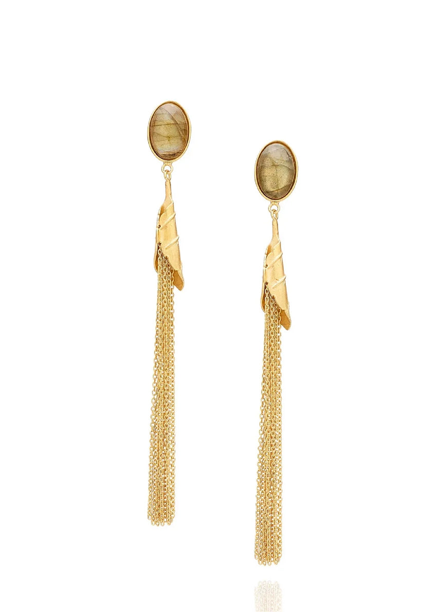Gold tassel earrings with stone accents on a white background