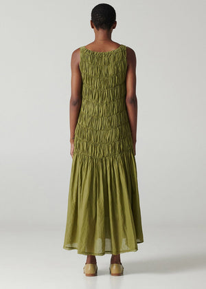 Long sleeveless dress with square neck and wide straps made of airy cotton voile fabric and shirred front.