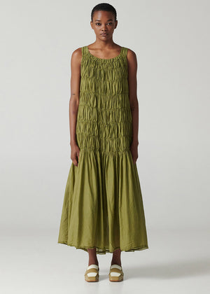 Long sleeveless dress with square neck and wide straps made of airy cotton voile fabric and shirred front.