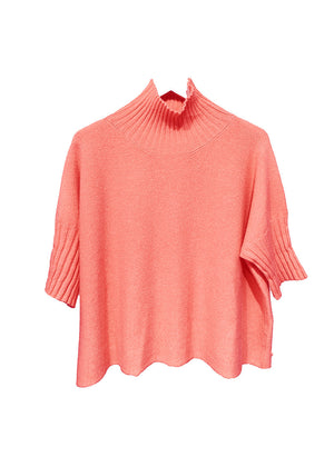 A very simple coral sweater with ribbed sleeves texture and turtle neck, the vertical ribs makes it classy and comfortable. Very easy to wear, medium length, this sweater is for intermediate spring/ autumn days.